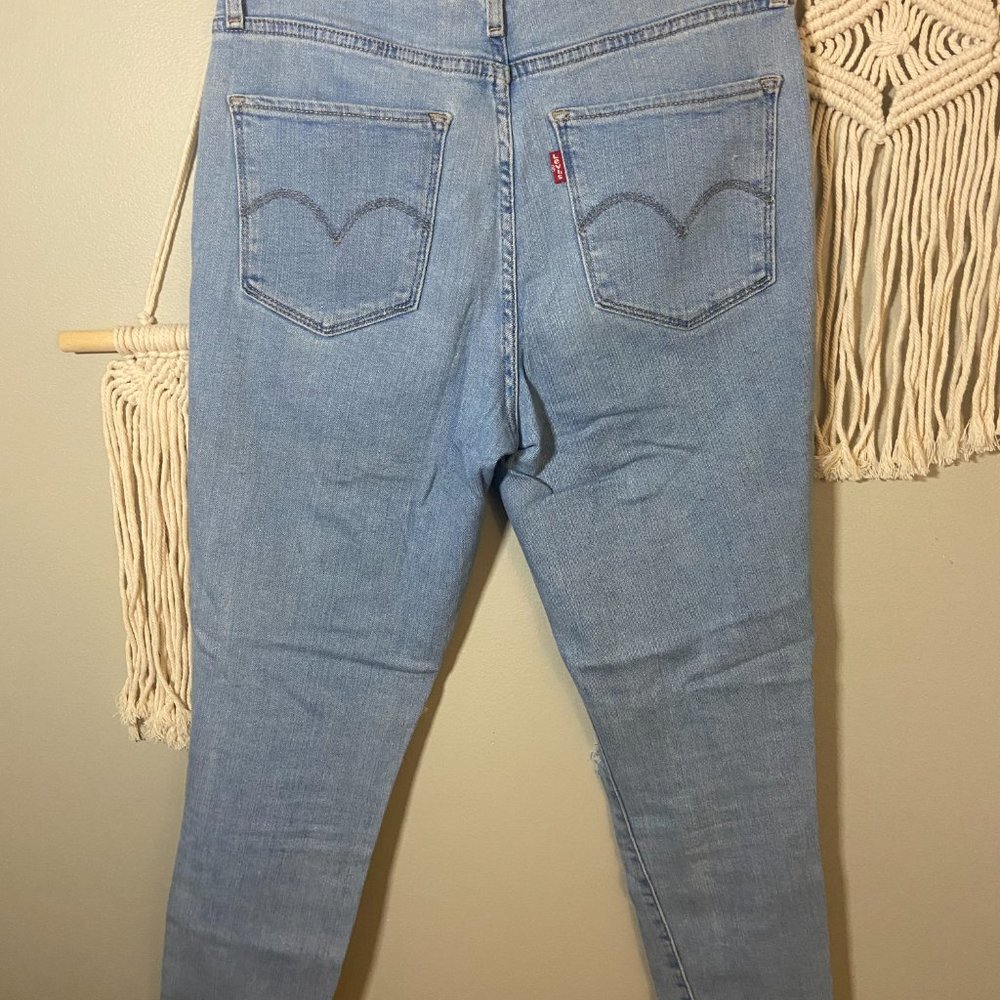 Levi's 721 Light-Washed, High Waisted Skinny Ripped Jeans - Picture 6 of 7